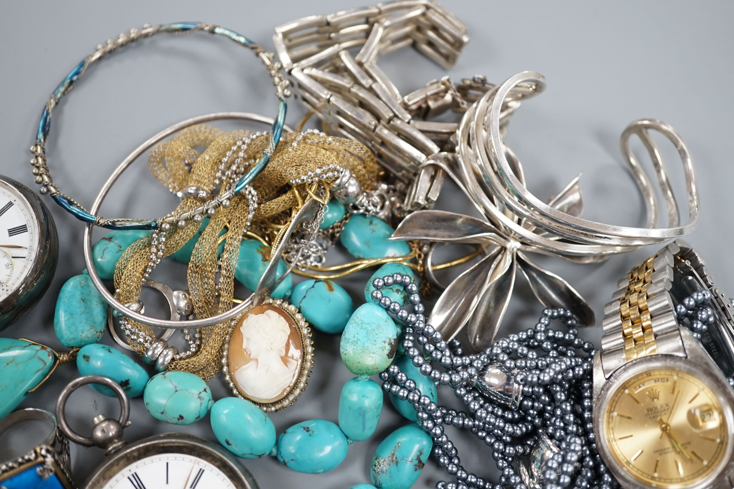 A small quantity of assorted costume jewellery, two silver pocket watches and assorted wrist watches including Timex.